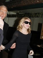 Madonna eating a pizza with David Letterman at Angelo's Pizza