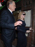 Madonna eating a pizza with David Letterman at Angelo's Pizza