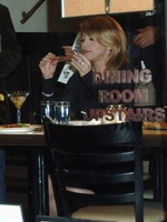 Madonna eating a pizza with David Letterman at Angelo's Pizza