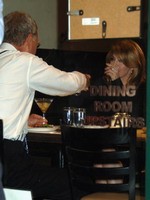 Madonna eating a pizza with David Letterman at Angelo's Pizza